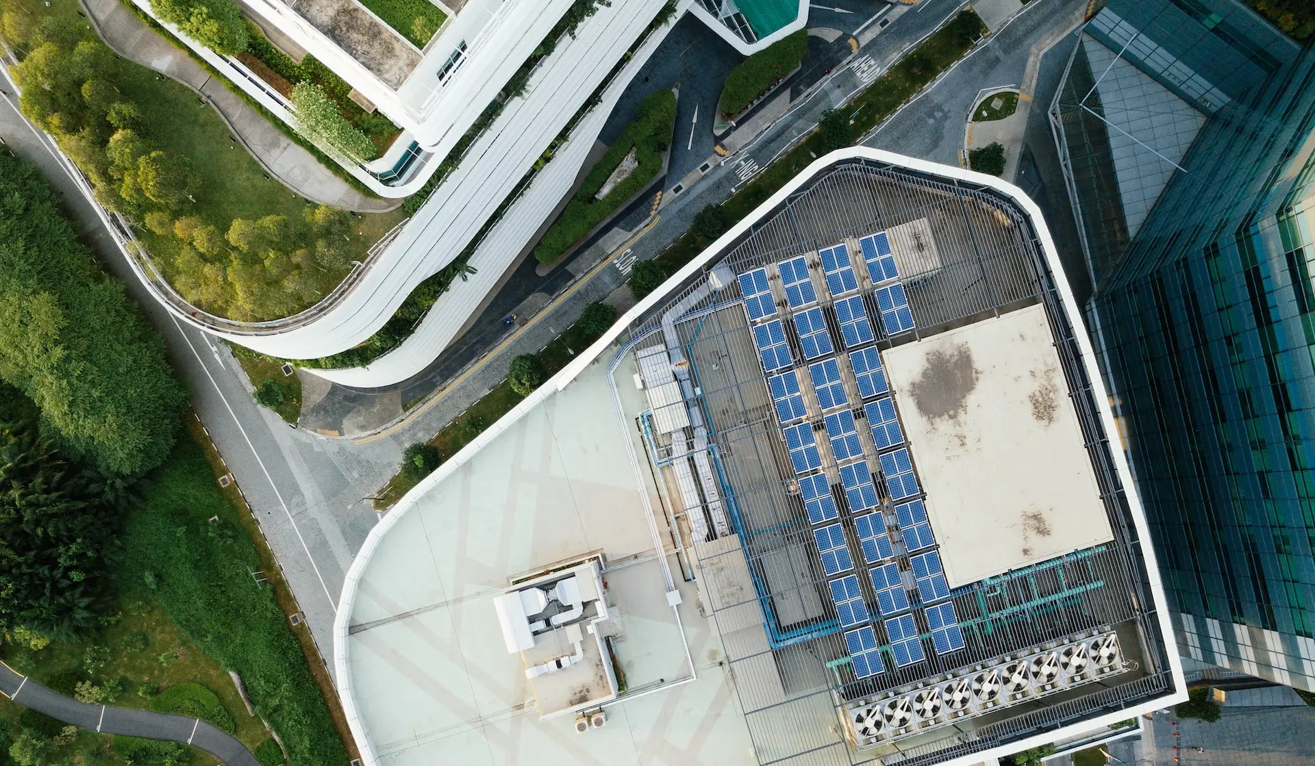 aerial photography of solar heater on building rooftop